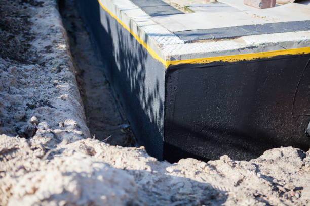 Professional Basement Waterproofing technician working in Okauchee, WI